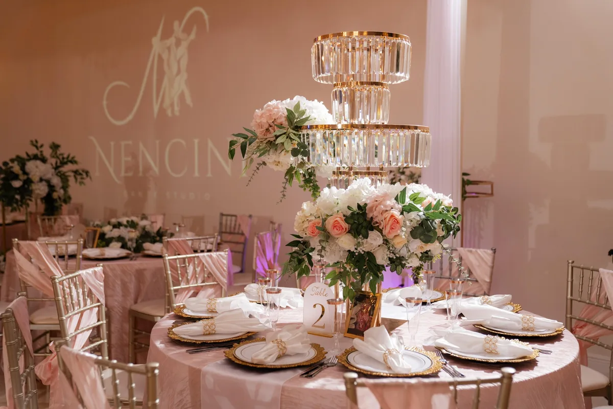 Crystal and floral table design inside Nencini Ballroom
