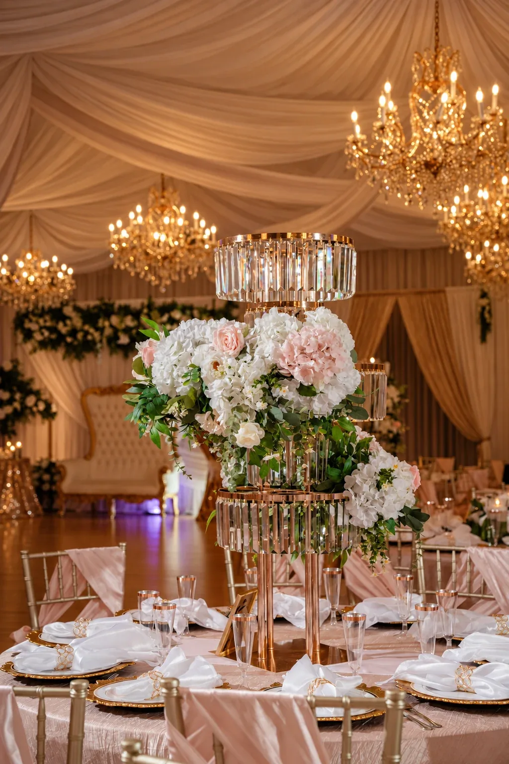 Blush flowers, crystal centerpieces and candlelight at Nencini Ballroom